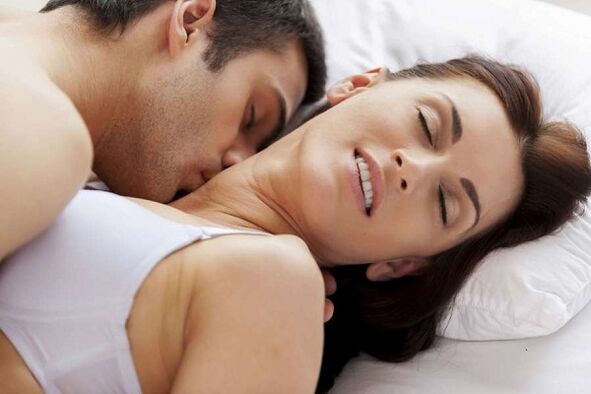 Excited men and women in the bed